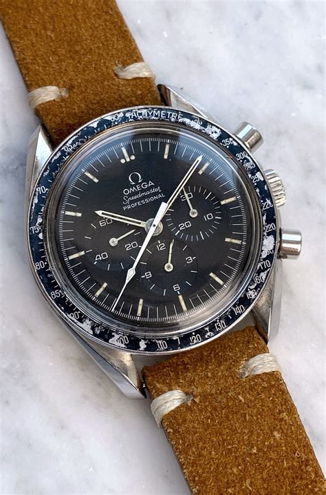 omega speedmaster moonwatch bezel.